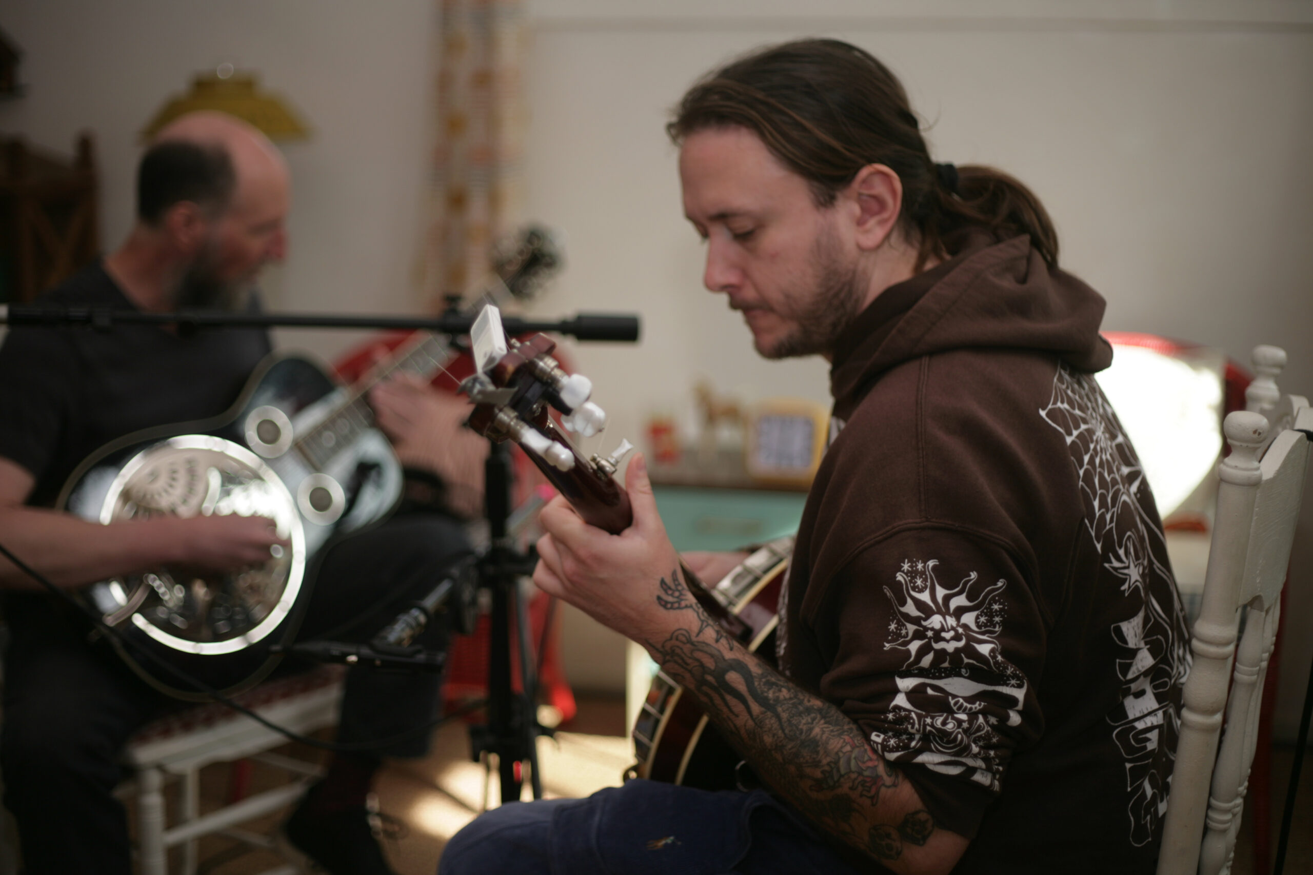 Two musicians warming up.