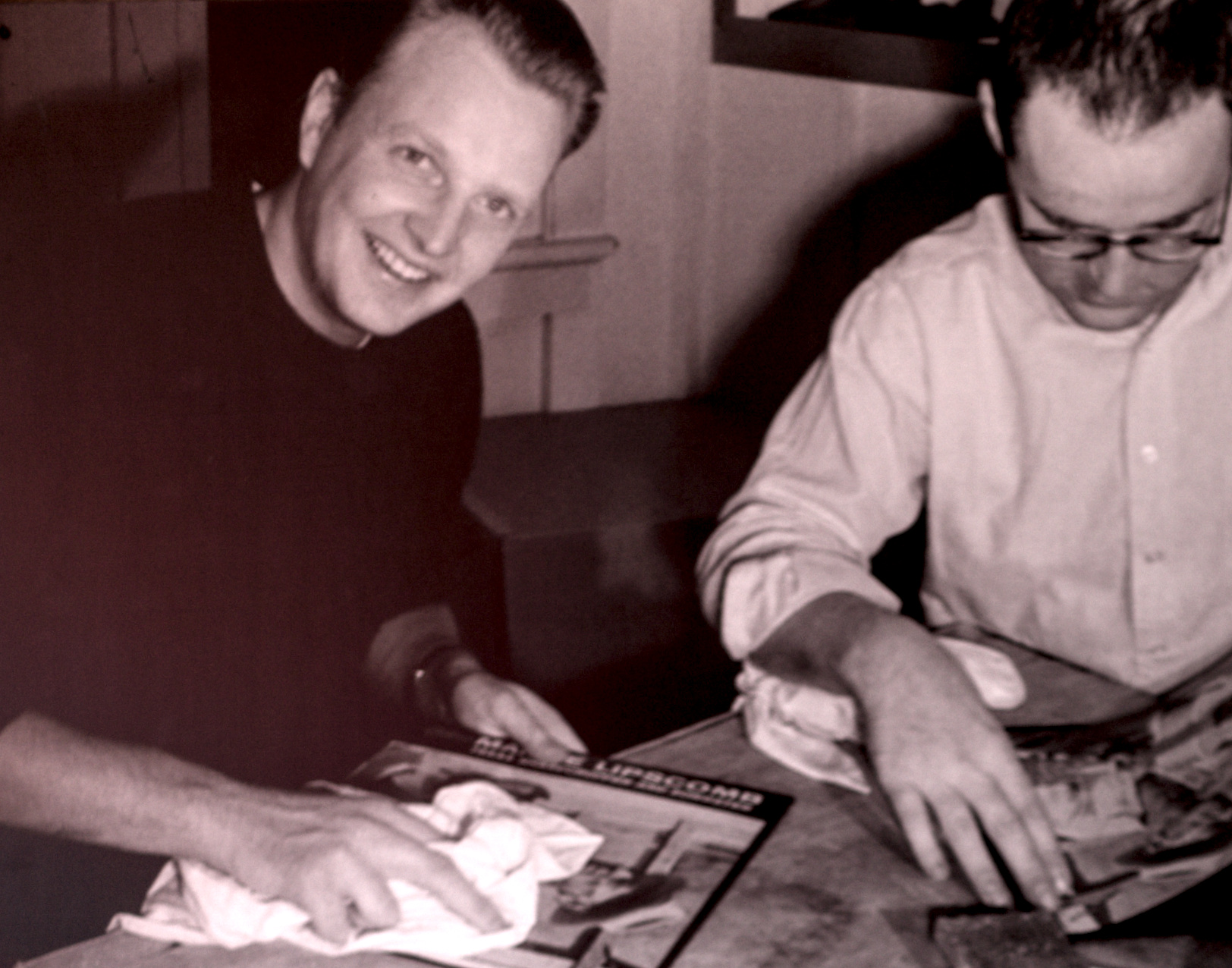 A photo of an old photo of Chris Strachwitz.